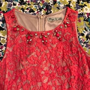 Pink lace dress with jeweled neckline